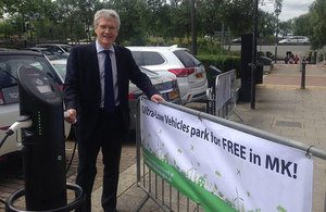 Transport Minister Andrew Jones launching the city’s new ‘green parking permit’ for EVs