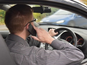 One in five people use their phone behind the wheel