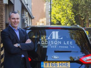 Andy Boland, CEO, Addison Lee, showcasing the company’s new branding
