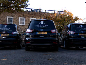 Row of black Ford Galaxys with Addison Lee livery