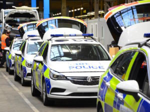 Police cars being converted for use