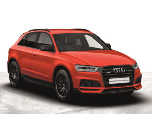 Red Audi Q3 Black Edition on white background