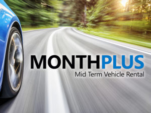 Side of blue car travelling along road with MonthPlus logo