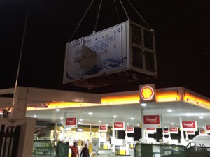 ITM Power hydrogen container being lowered onto Shell forecourt