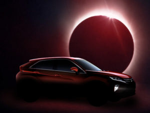 Teaser image of Mitsubishi Eclipse Cross with backdrop of sun being eclipsed