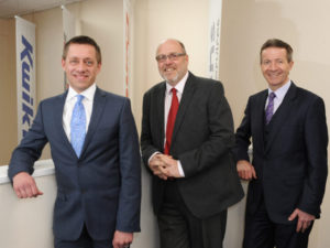 Andy Fern and Simon Lucas of Kwik Fit with outgoing fleet director Peter Lambert