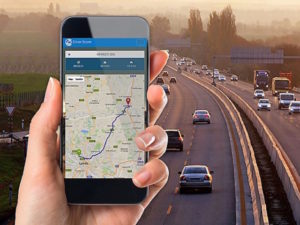 Ctrack's DriverMobi app superimposed above motorway