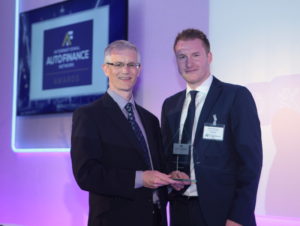Daniel St Claire, carsharing & eMobility manager at Alphabet (right), with the 2017 Intelligent Mobility Services award.