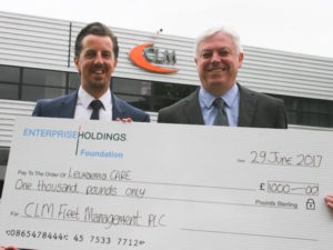 (L-R) Ross Joiner of Enterprise Rent-A-Car presents the cheque for Leukaemia Care to Chris Mitchinson of CLM