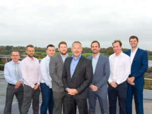Synergy Automotive MD, Paul Parkinson (centre) and team members