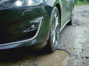New Ford Focus pothole detection technology can reduce the impact of striking potholes