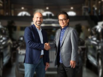 Uber CEO, Dara Khosrowshahi, and Toyota Motor Corporation executive vice president Shigeki Tomoyama