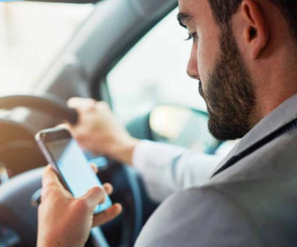 Drivers to be banned from any hand-held mobile phone usage